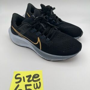 Nike Women's Black and Gold Athletic Shoes